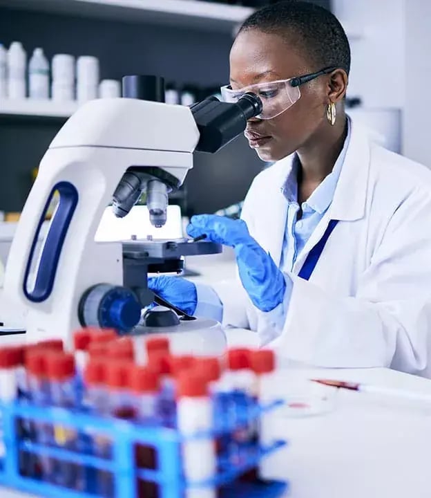 10_scientist-in-laboratory-looking-throught-modern-microscope-624x720-1-1