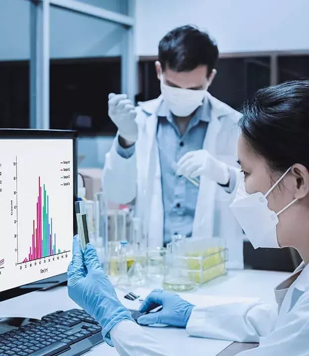 7_teamwork-collaboration-looking-at-sample-drug-or-analysing-a-sample-in-laboratory-research-624-x720-2-1
